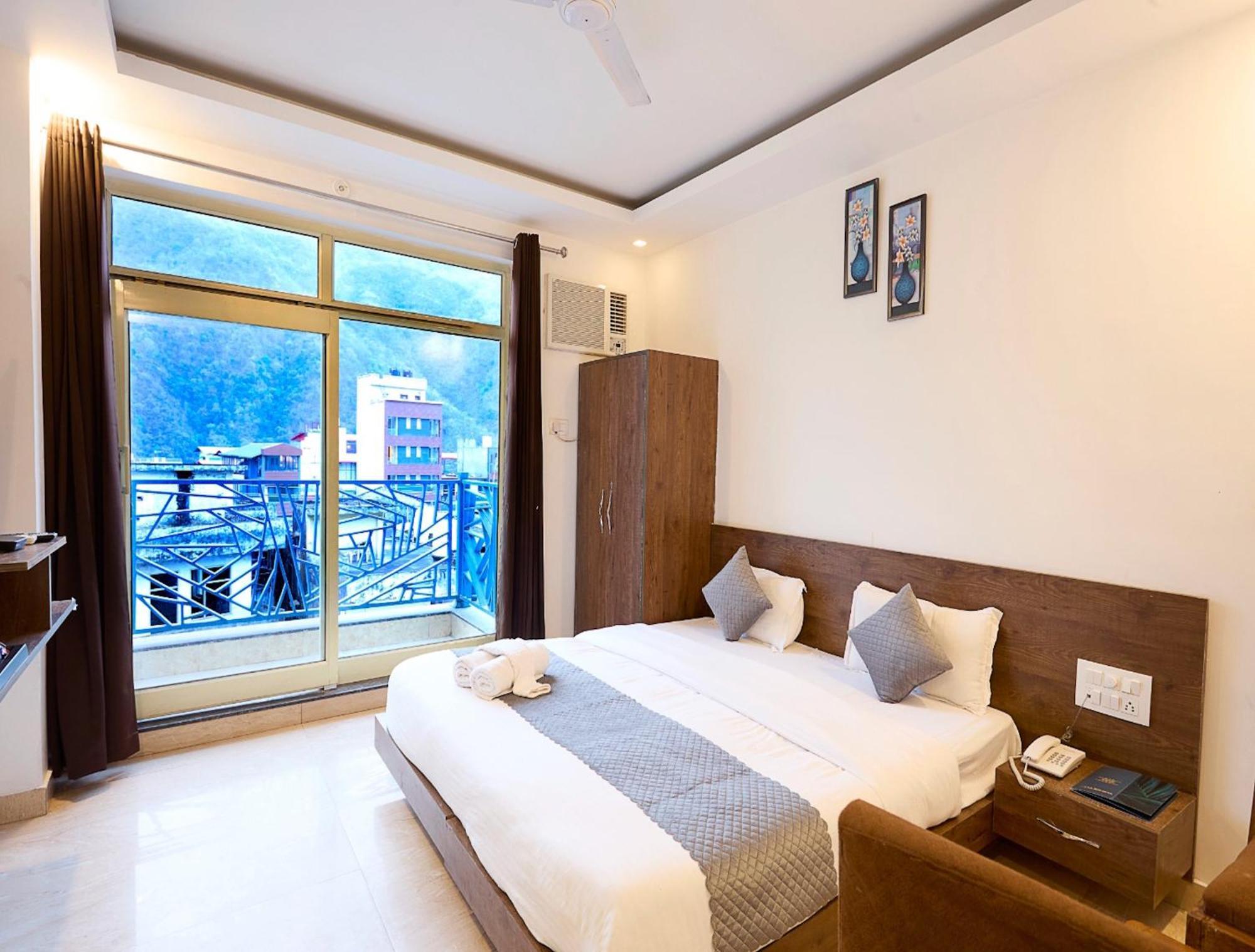 La Riqueza Pride Inn Tapovan # Swimming Pool# Walking Distance To Ganga Ghat & Lakshman Jhula # Mountain View Rooms # Gym # Spa # Parking 3*